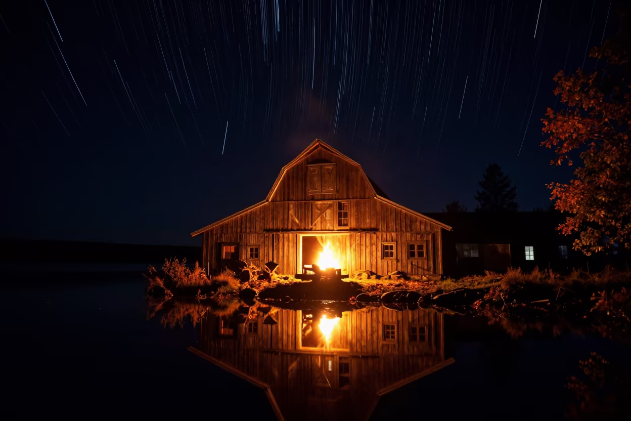 Star Trails Over Autumn Barn with Fire Reflections in under the clearest stretch of sky near Sandvika