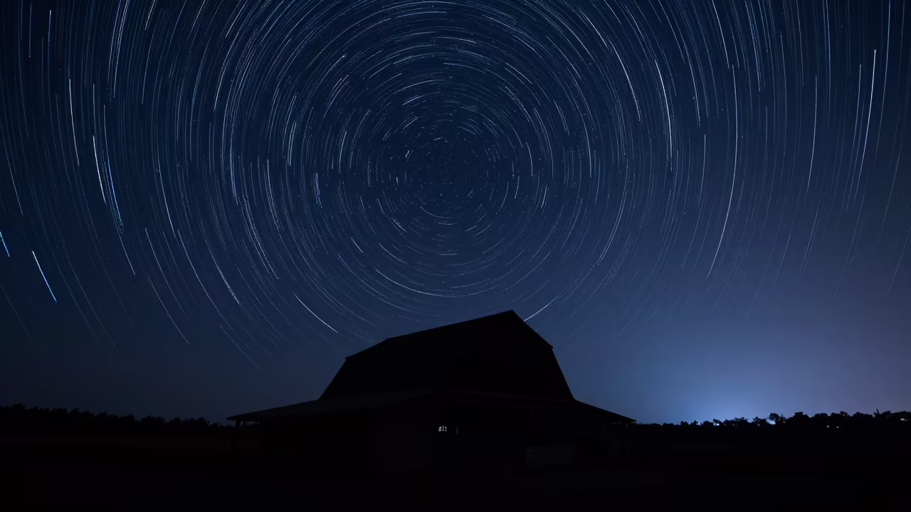 Star Trails Over Silhouetted Barn Near Mumbai in under the clearest stretch of sky near Dadar, Mumbai