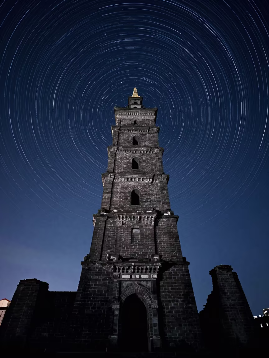 Star Trails Spin Over Songshan Ruined Tower in beneath a moon-washed horizon near Songshan, Taipei