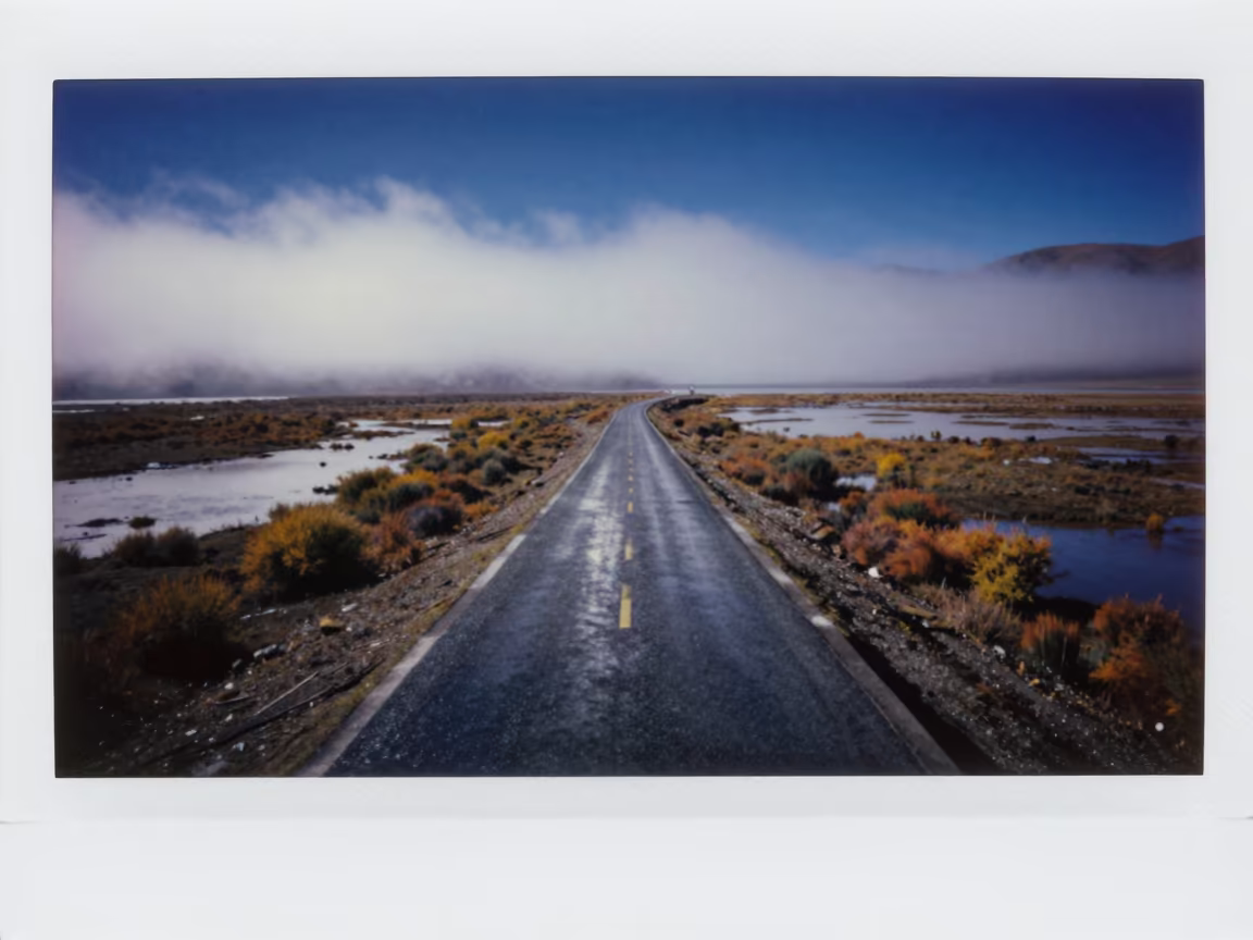 Starry Sky Over Misty Tibetan Floodplain Road in across a floodplain after rain in Tibet