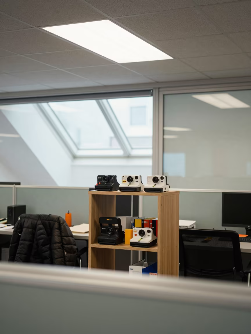 Stationery Shelf Under Recessed Light in Plovdiv Boardroom in at a boardroom table before a meeting near Plovdiv