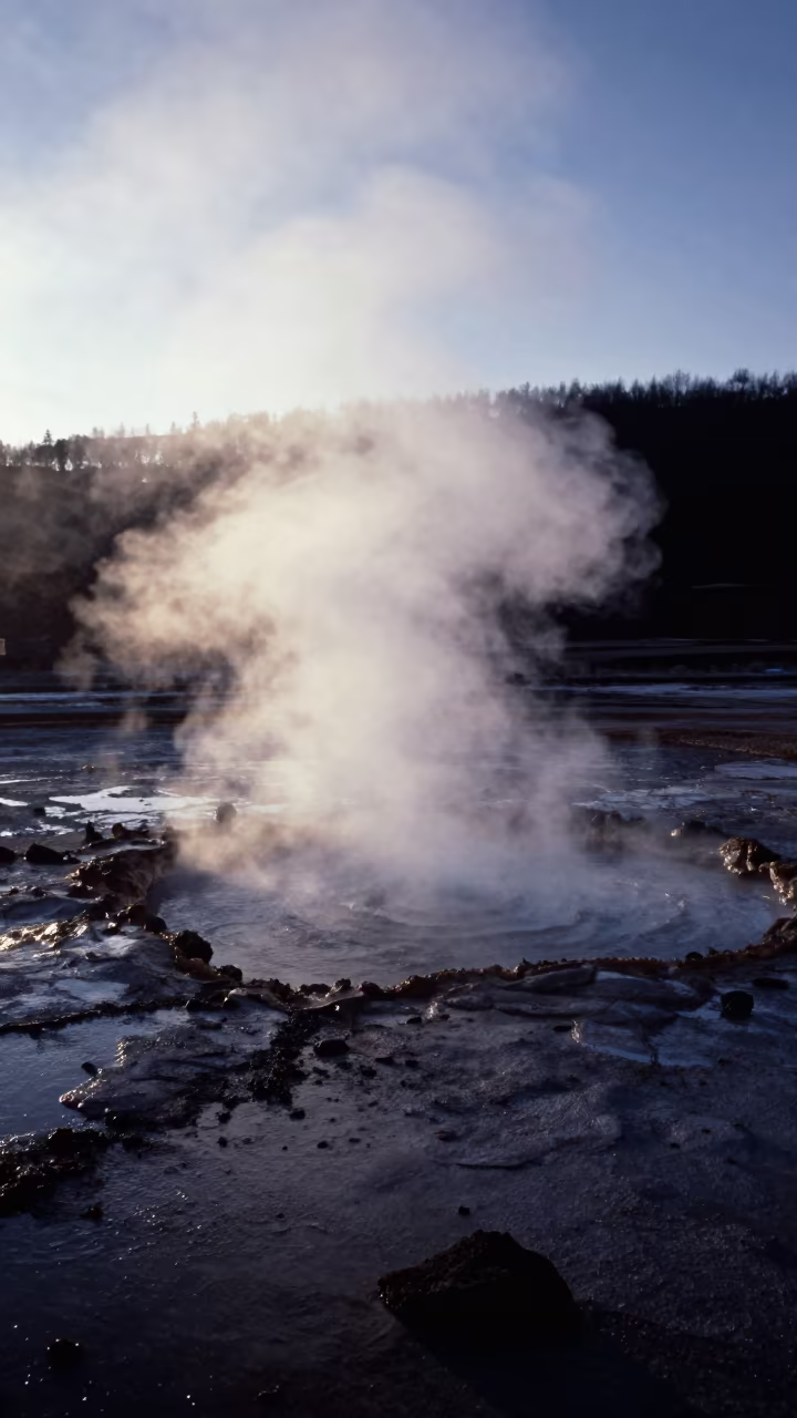 Steam Rising from Volcanic Spring at Dawn in along a wave-cut shoreline near Zermatt