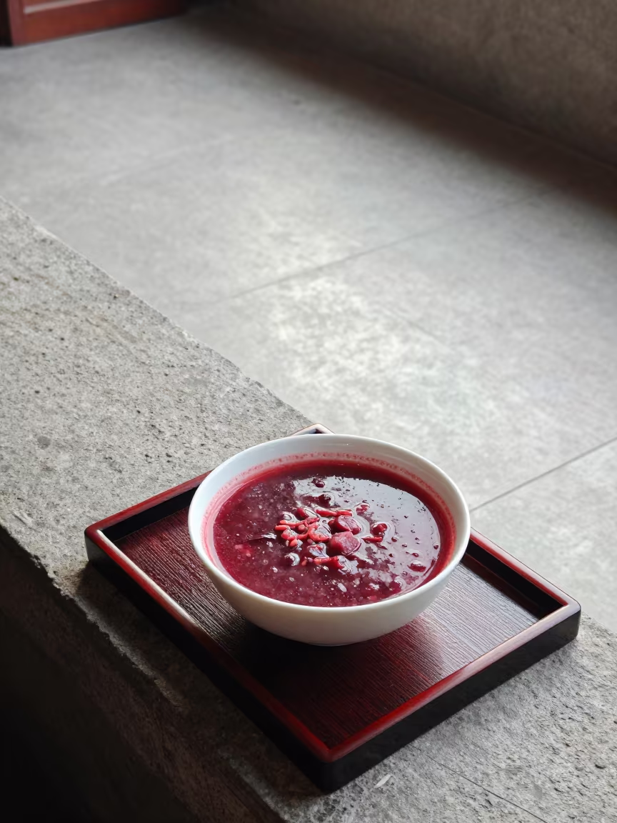 Steaming Borscht Bowl on Stone Sill Dawn Light in on a lacquered tray in Wangfujing, Beijing