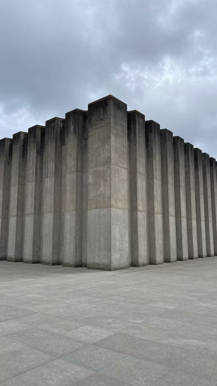 Stepped Ziggurat Facade in Glasgow Plaza in across a formal civic plaza in Glasgow