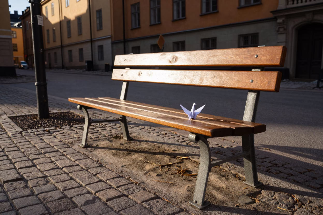 Stockholm Late Afternoon Street Scene with Origami Crane on Wooden Bench in in Stockholm, Sweden