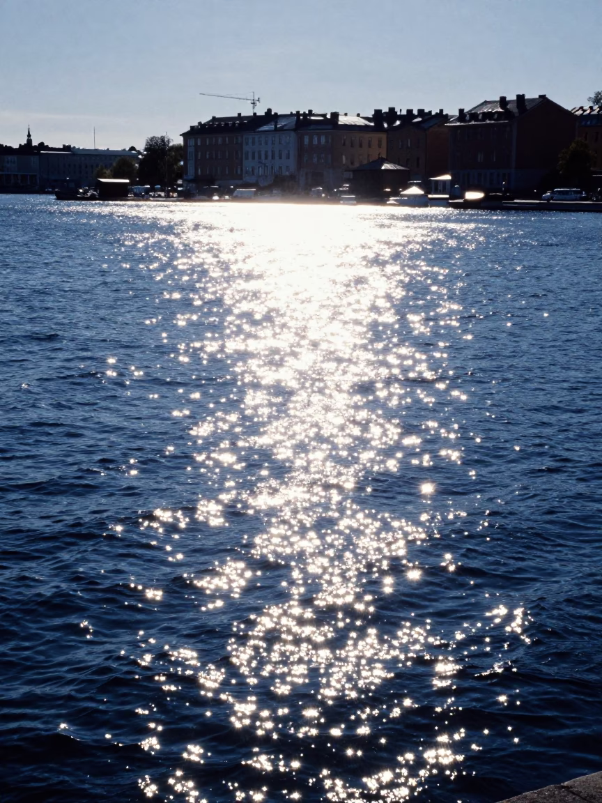 Stockholm Sweden Noon Sunlight Reflecting Off Harbor Water And Classic Architecture in in Stockholm, Sweden