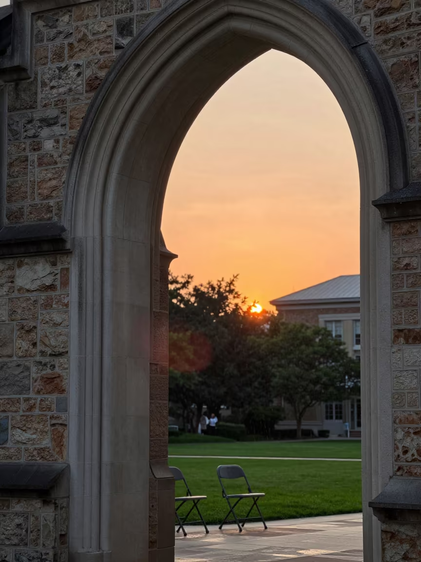 Stone Archway and Chairs Under Sunset Drizzle in on a graduation lawn under folding chairs in Mira-Bhayandar