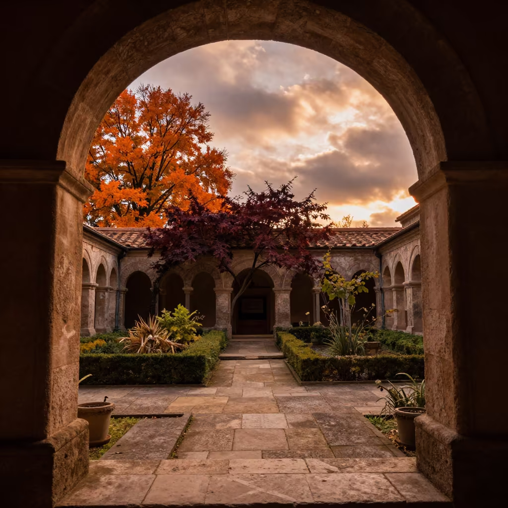 Stone Cloister Arches Frame Autumn Garden at Sunset in in a cloister garden near İnegöl
