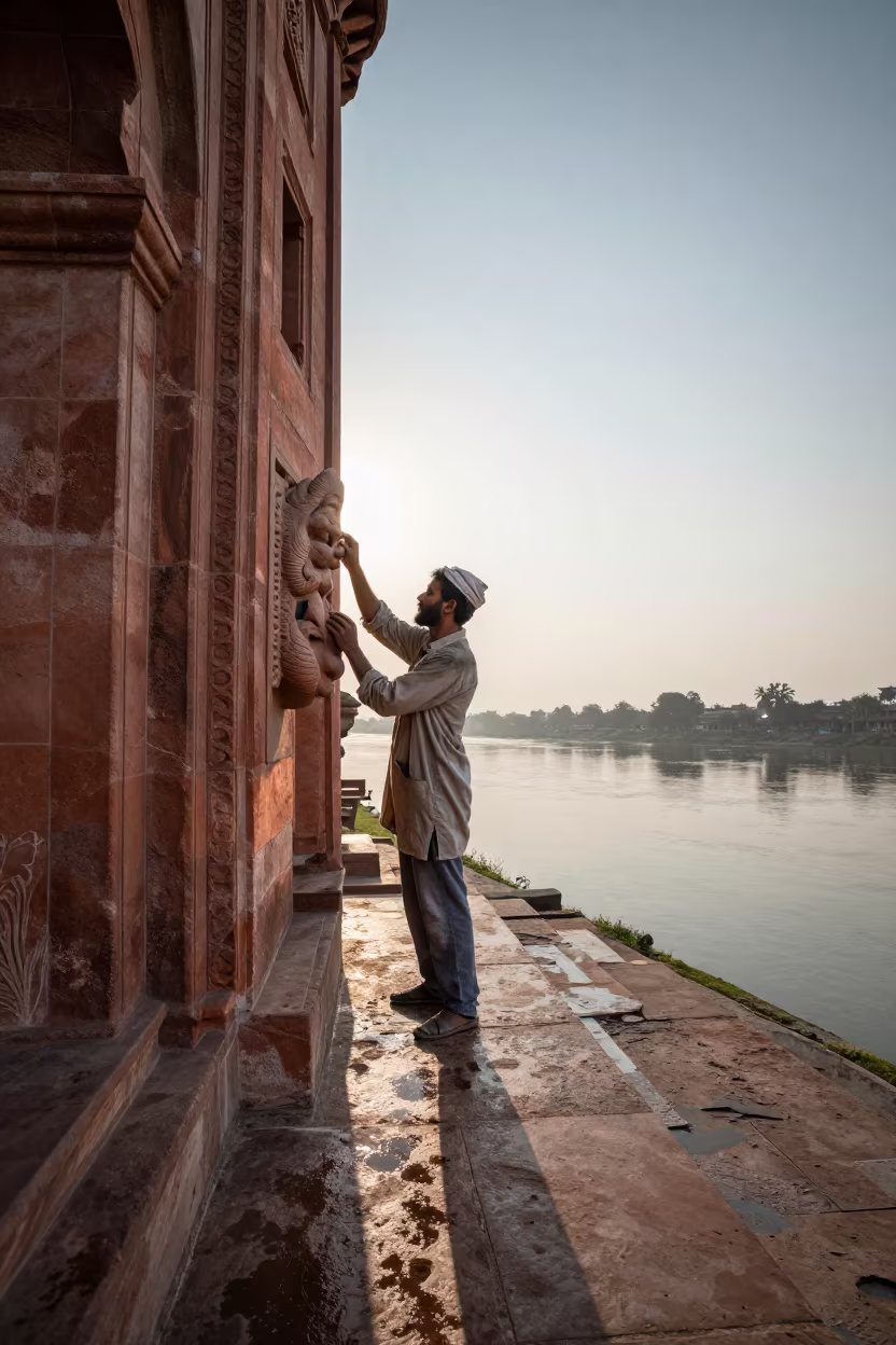 Stone Mason Carving Gargoyle in Lahore in near a riverside landing in Lahore