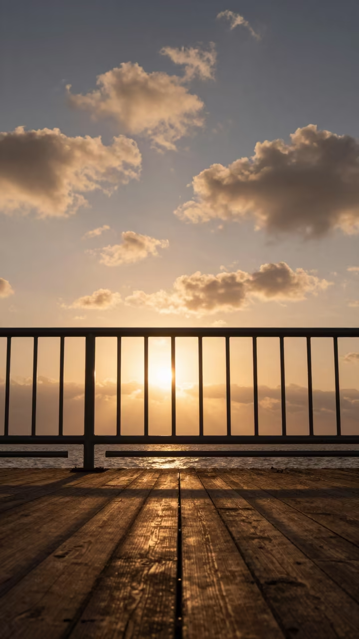 Stratocumulus Clouds Through Pier Railing Holes in on a pier railing in Barinas