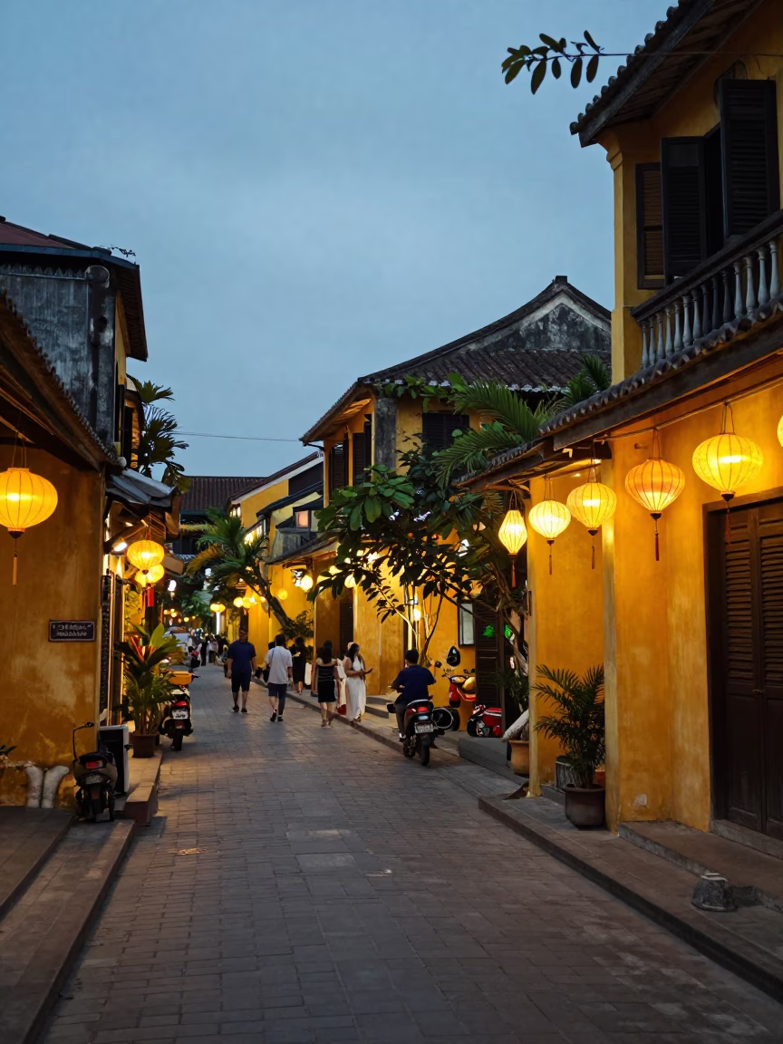 Street Scene at As City Lights Begin To Glow in Hoi An in in Hoi An, Vietnam