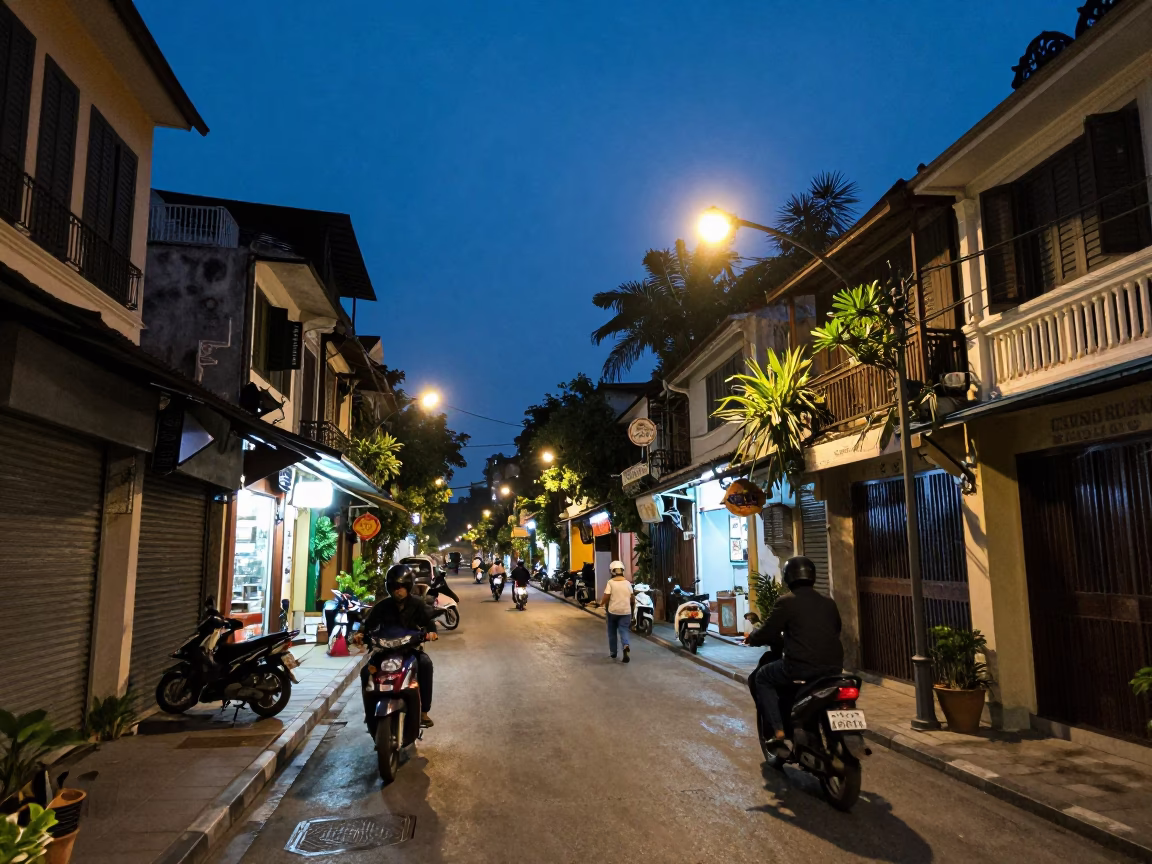 Street Scene in Hanoi at As City Lights Begin To Glow in in Hanoi, Vietnam