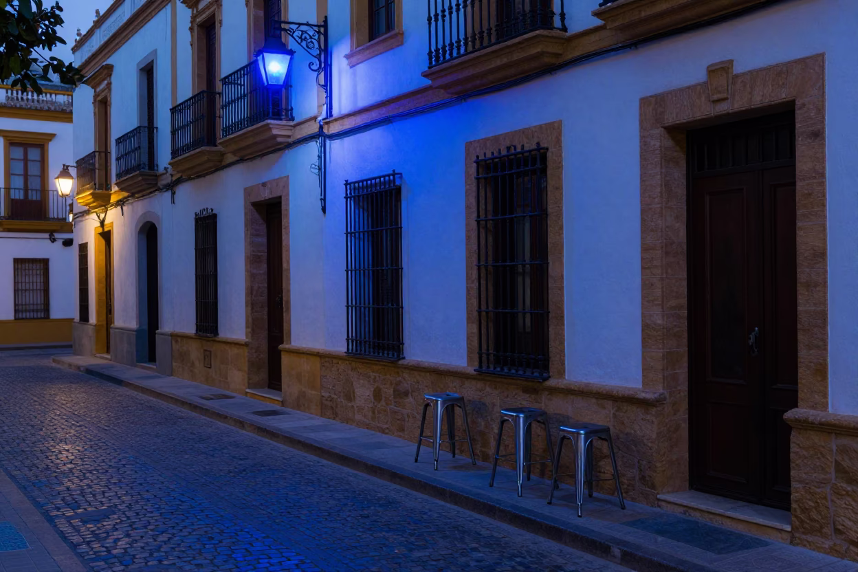 Street Scene in Seville at The Last Blue Light Of Evening in in Seville, Spain