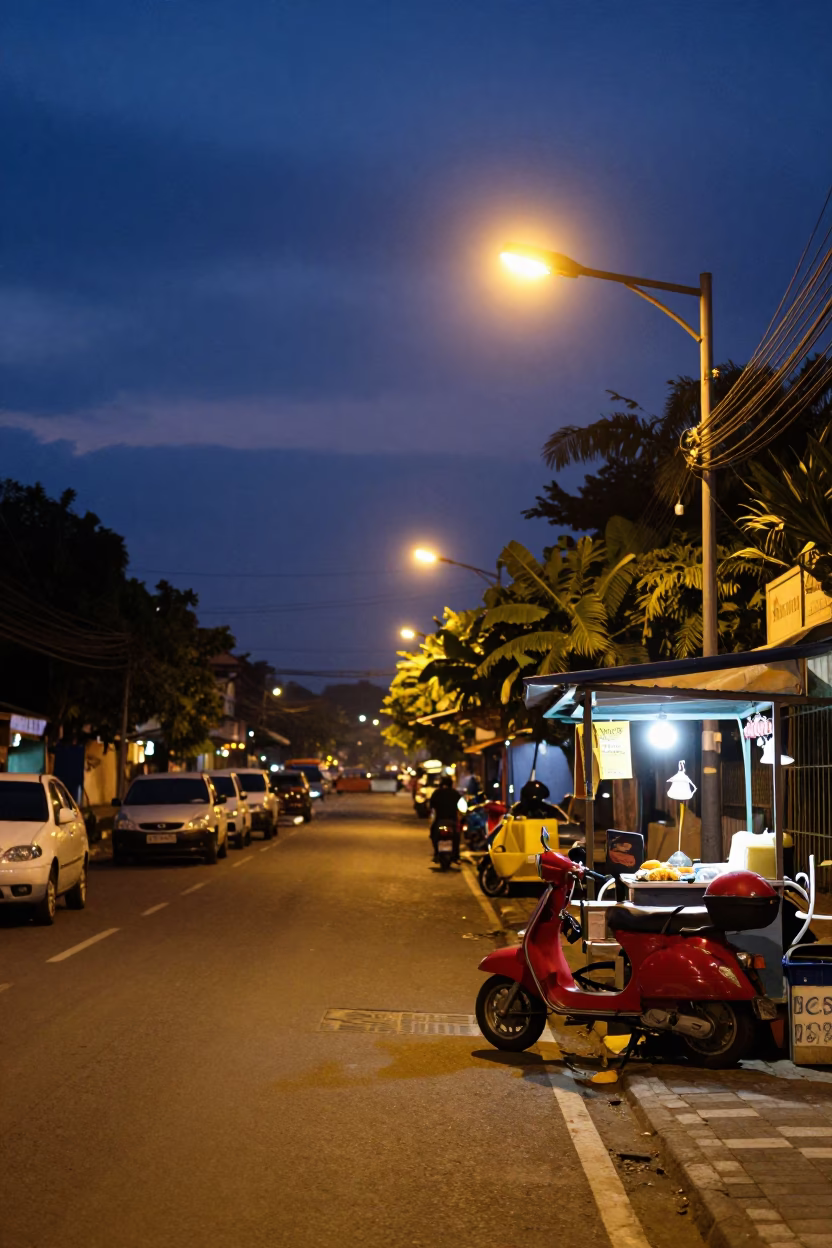 Street Scene in Yogyakarta at As City Lights Begin To Glow in in Yogyakarta, Indonesia