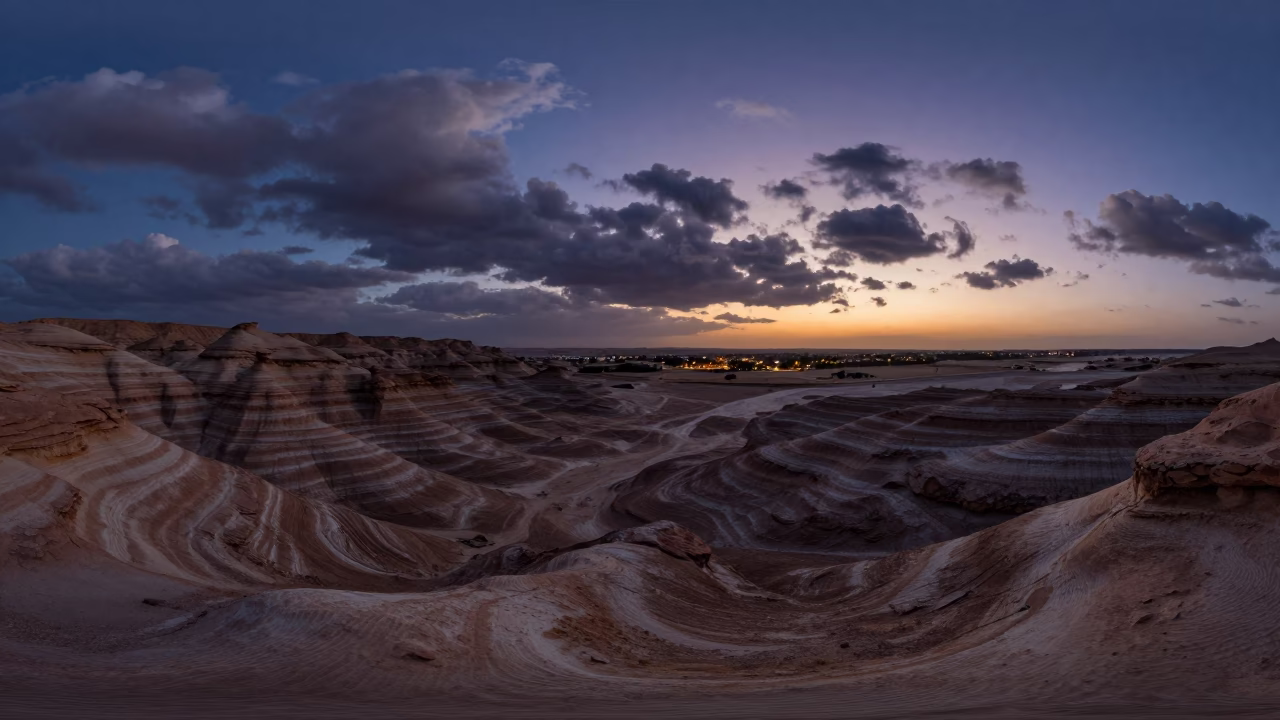 Striped Desert Valley Under Indigo Twilight Sky in across a wide valley floor near Abu Dhabi
