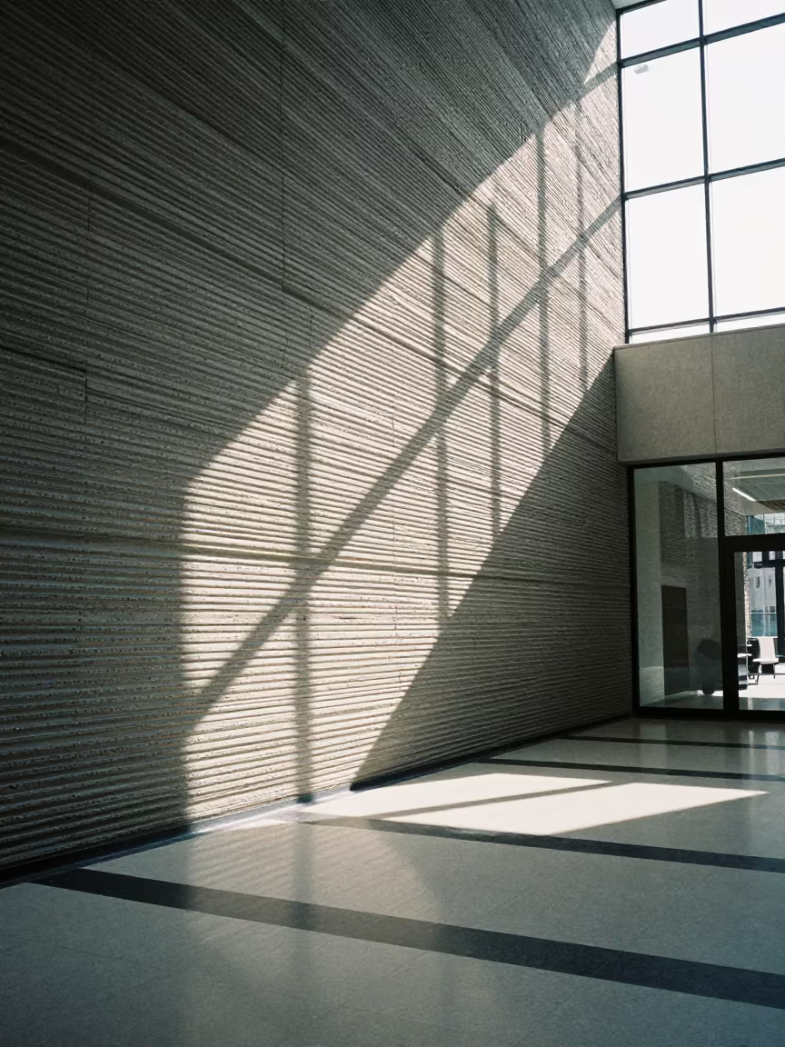 Striped Shadows on Ribbed Concrete in Timisoara Lobby in inside a ribbed concrete lobby in Timisoara