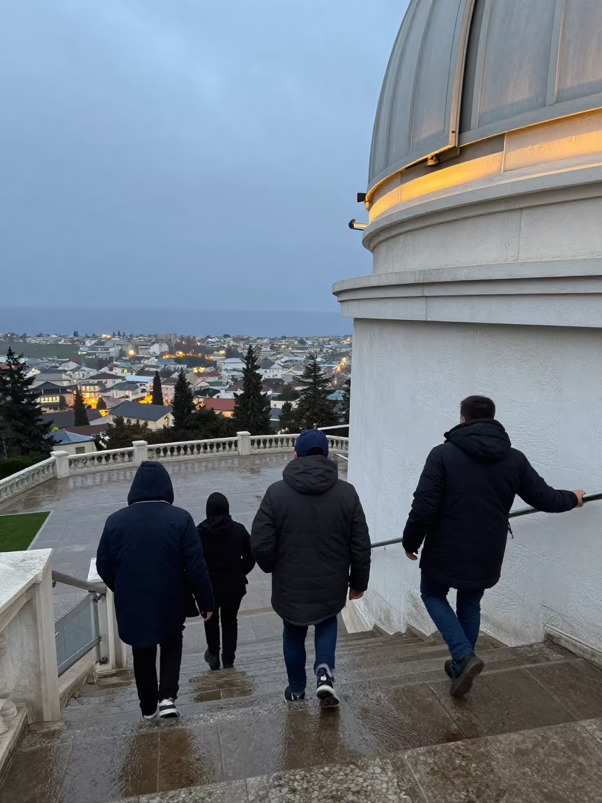 Students Climbing Observatory Stairs Twilight in across a rain-washed campus courtyard near Skhirat