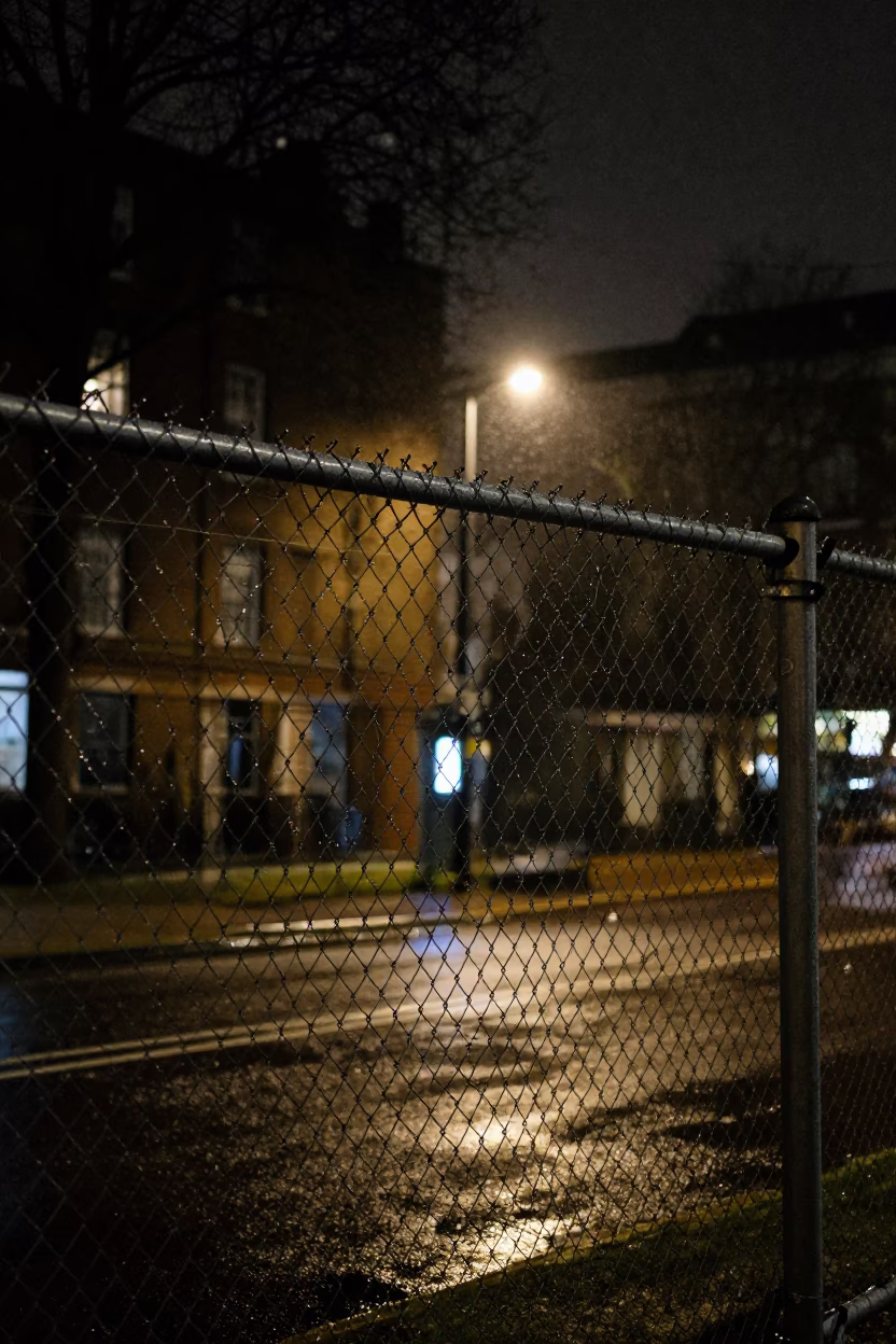 Substation Fence in London at Deep In The Night Light in in London, United Kingdom