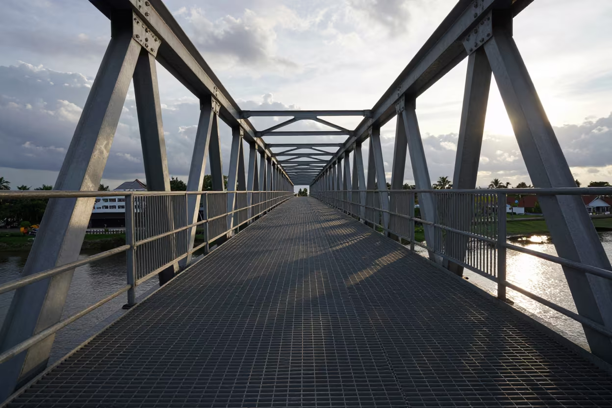 Sulawesi Bridge Walkway Shadows Wet Season Light in along a bridge maintenance walkway in Sulawesi