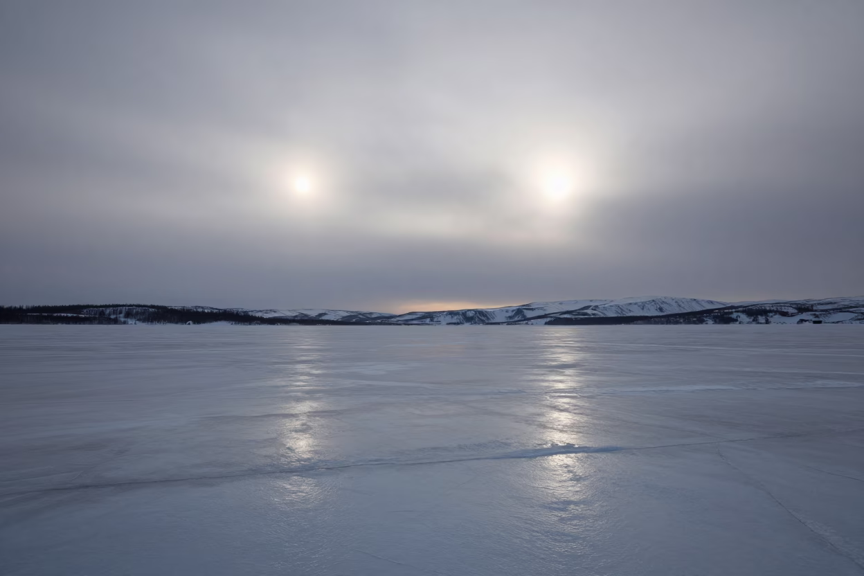 Sun Dogs Flanking Sun Over Frozen Lake Anchorage in near Anchorage