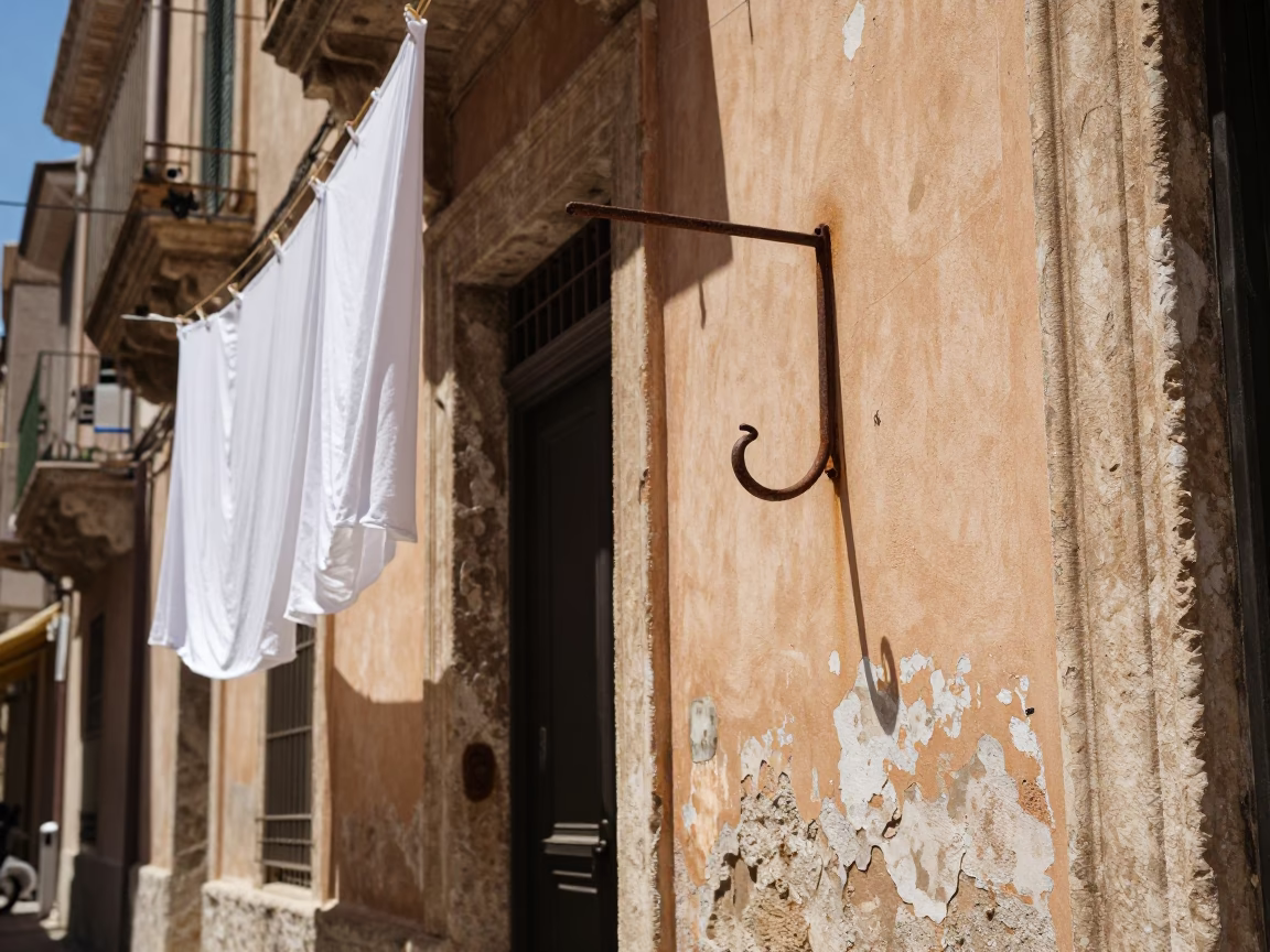 Sun-Drenched Palermo Street Scene with Hanging Laundry and Traditional Architecture in in Palermo, Italy