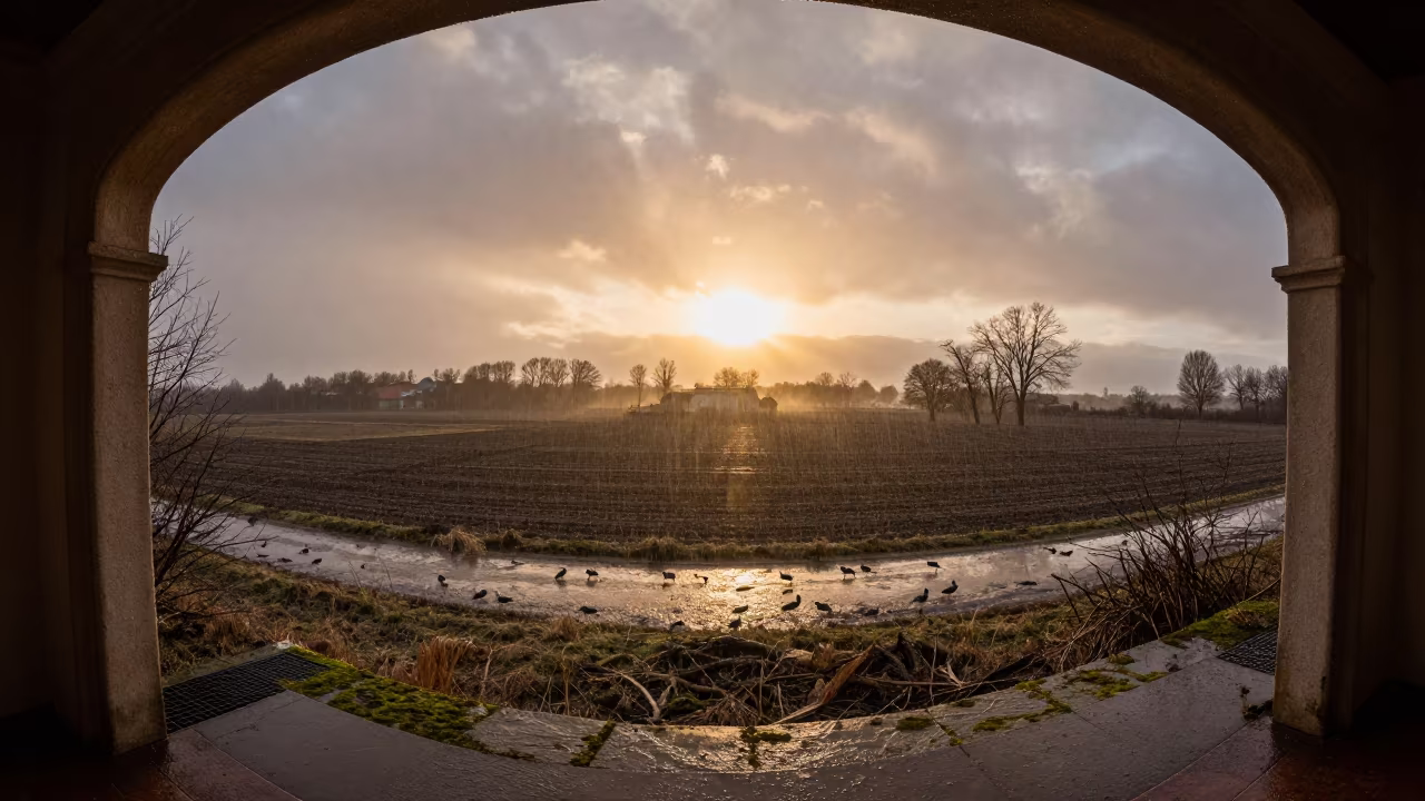 Sun Flare Through Polish Doorway at Sunset in across a storm-bright plain in Poland