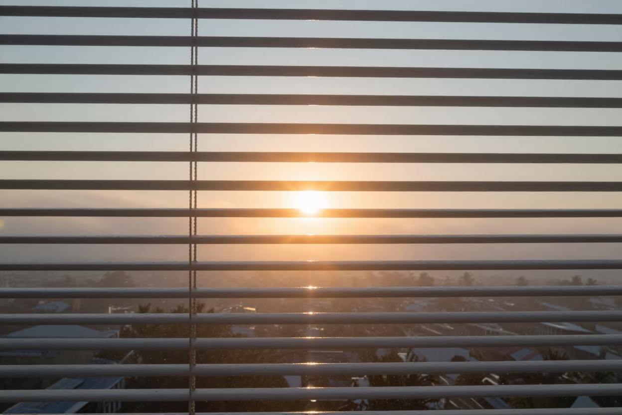 Sun Flare Through Blinds Over Foggy Holguin Coast in through low marine fog near Holguin
