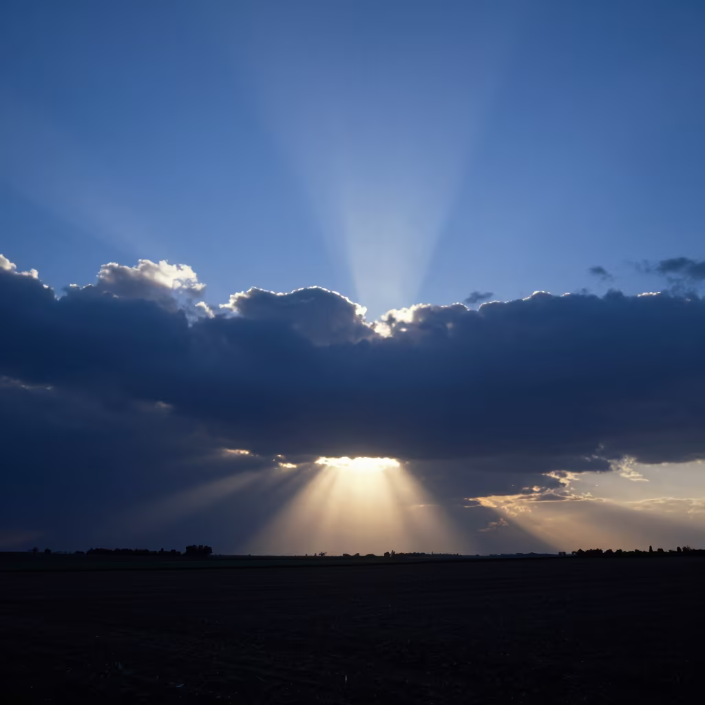 Sun rays break through storm clouds near Zaragoza in near Zaragoza