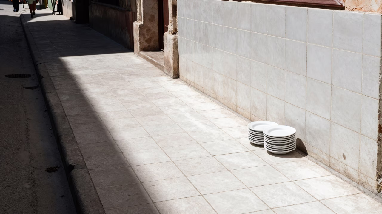 Sun stripe across tile in Havana Cuba noon light candid street moment in in Havana, Cuba