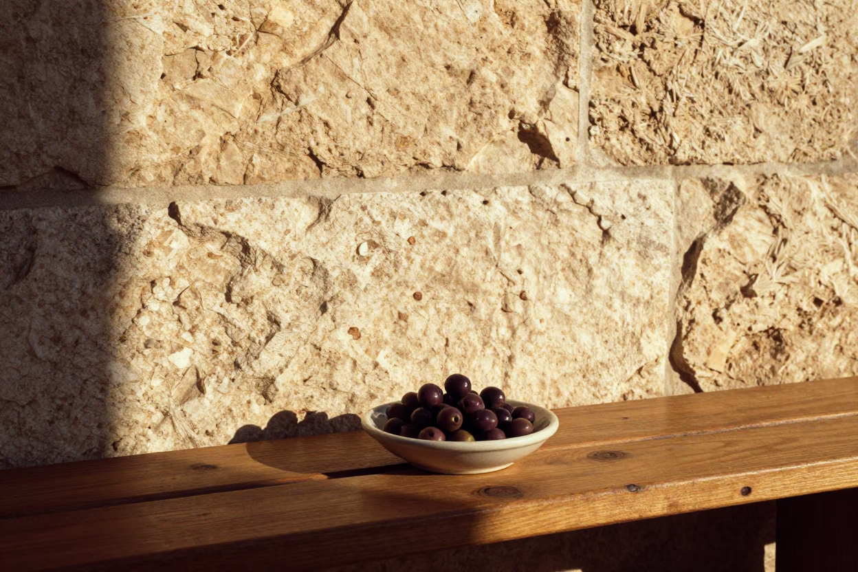 Sun-Warmed Stone Wall and Olive Dish in Athens Greece Early Afternoon Street Scene in in Athens, Greece