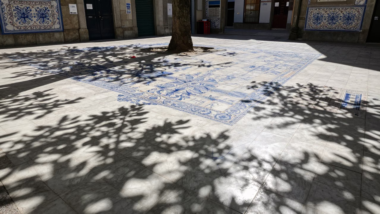 Sunlight and Leaf Shadows on Azulejo Tiles in Porto Portugal Courtyard in in Porto, Portugal