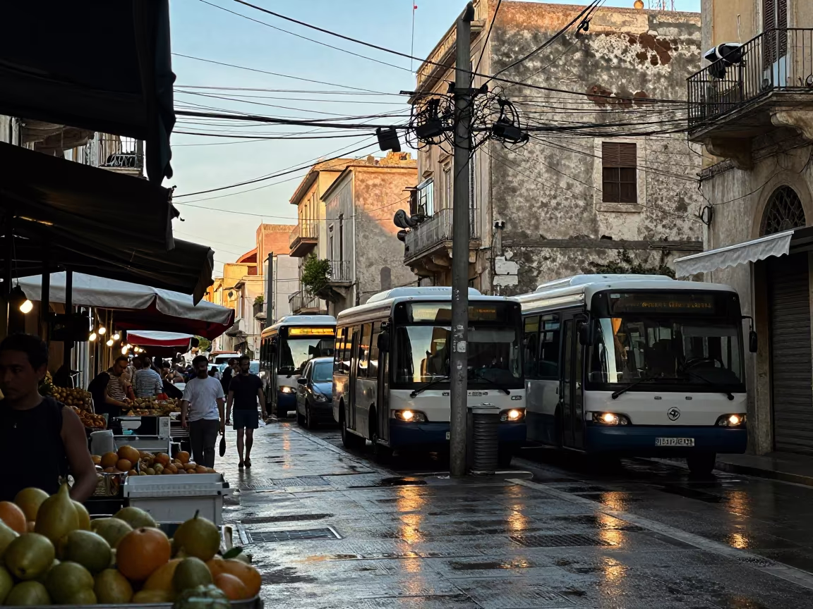 Sunlight on Bari Power Lines Above Market Street in along a market-lined side street in Bari