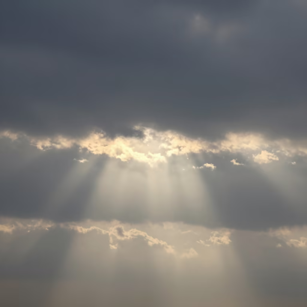 Sunlight Pierces Dark Storm Clouds Dawn in beneath fast-moving cloud bands near Rawalpindi
