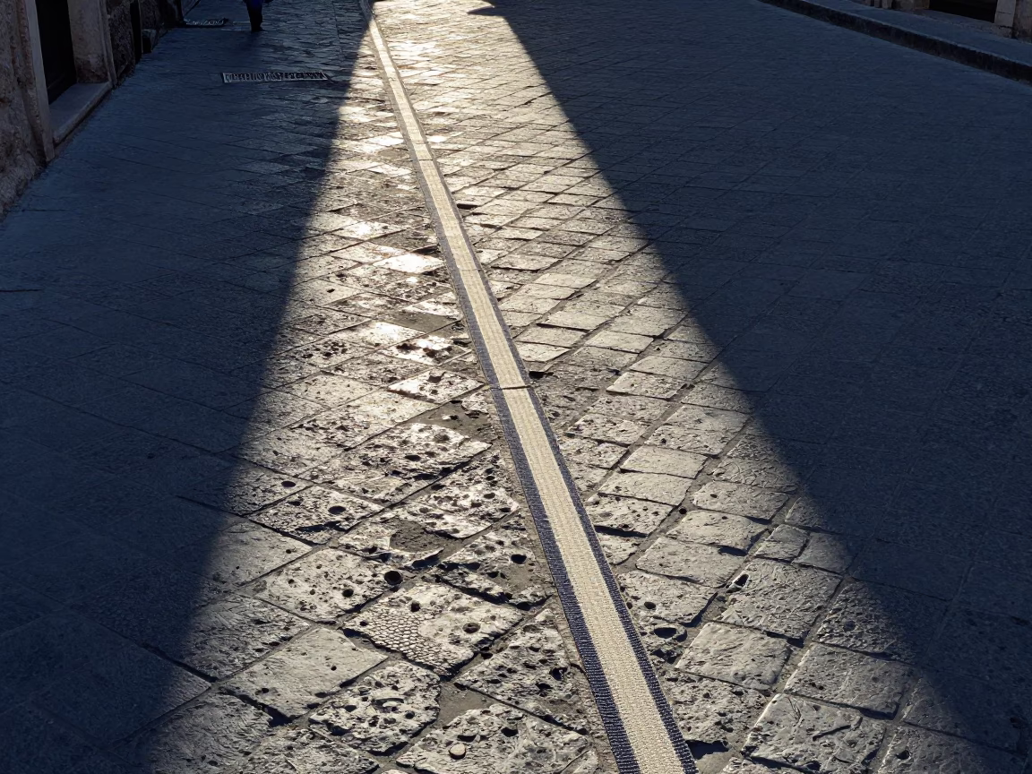 Sunlight stripe across fabric seam on Palermo street before sunrise in in Palermo, Italy