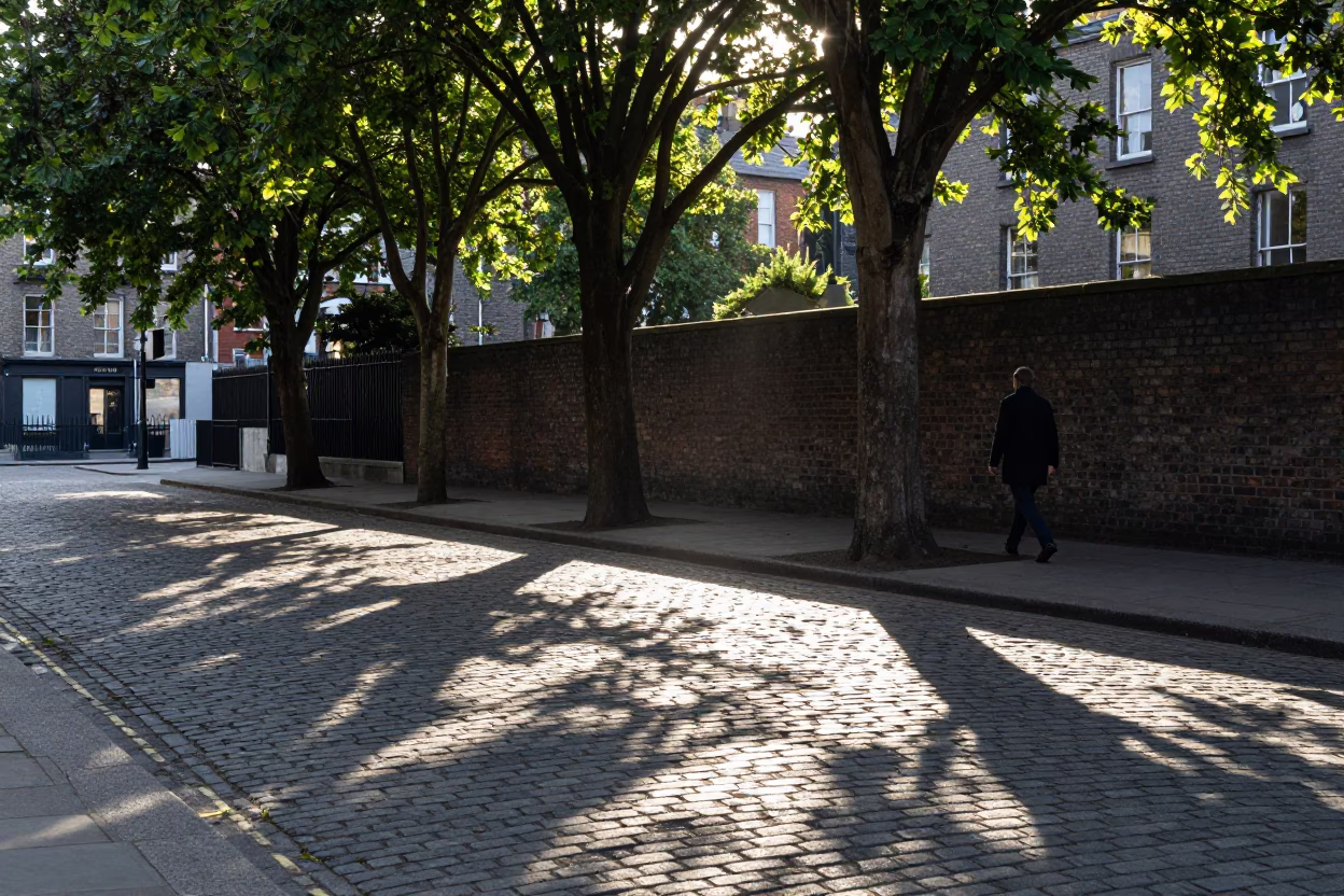 Sunlight Stripes on Dublin Cobblestones and Urban Street Life in in Dublin, Ireland