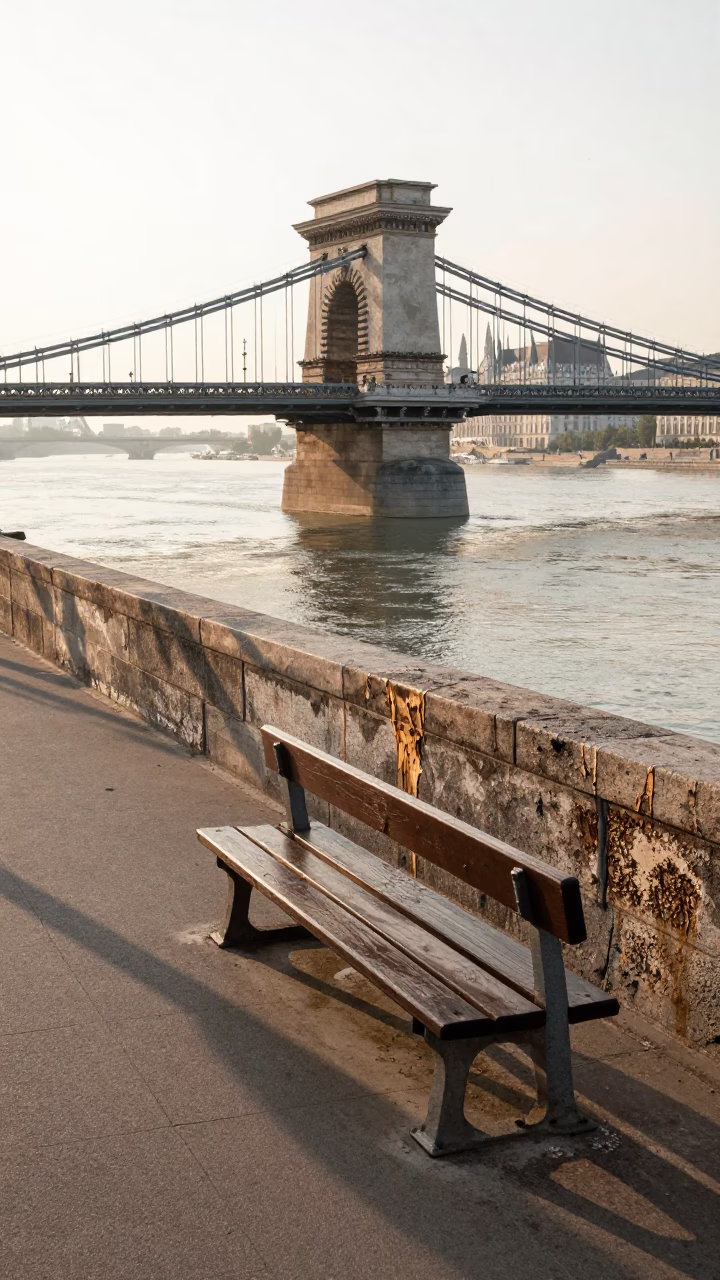 Sunlit Budapest Danube Embankment with Dried Enamel Drips and Morning Light in in Budapest, Hungary