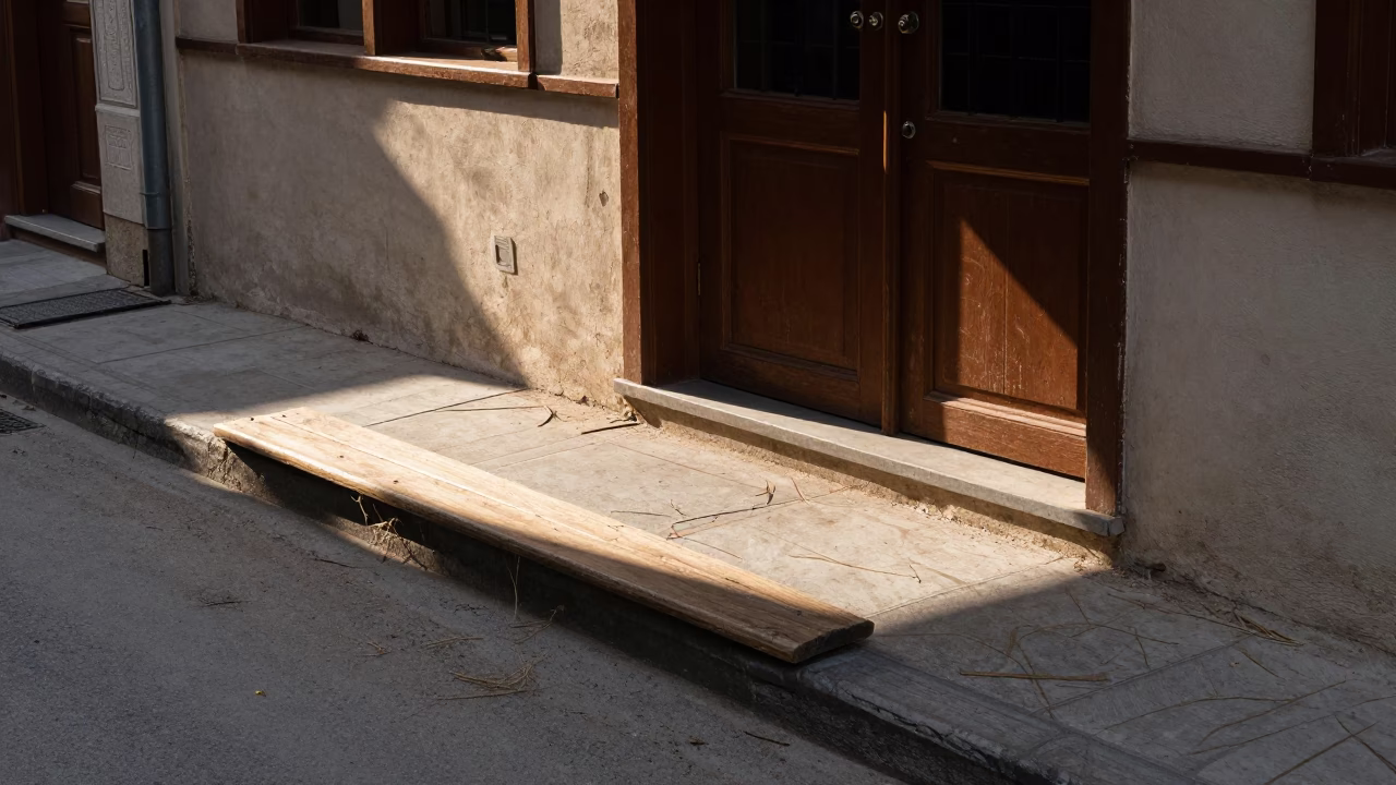 Sunlit Izmir Street Corner with Twine Fibers and Door Mats in Early Afternoon Light in in Izmir, Turkey