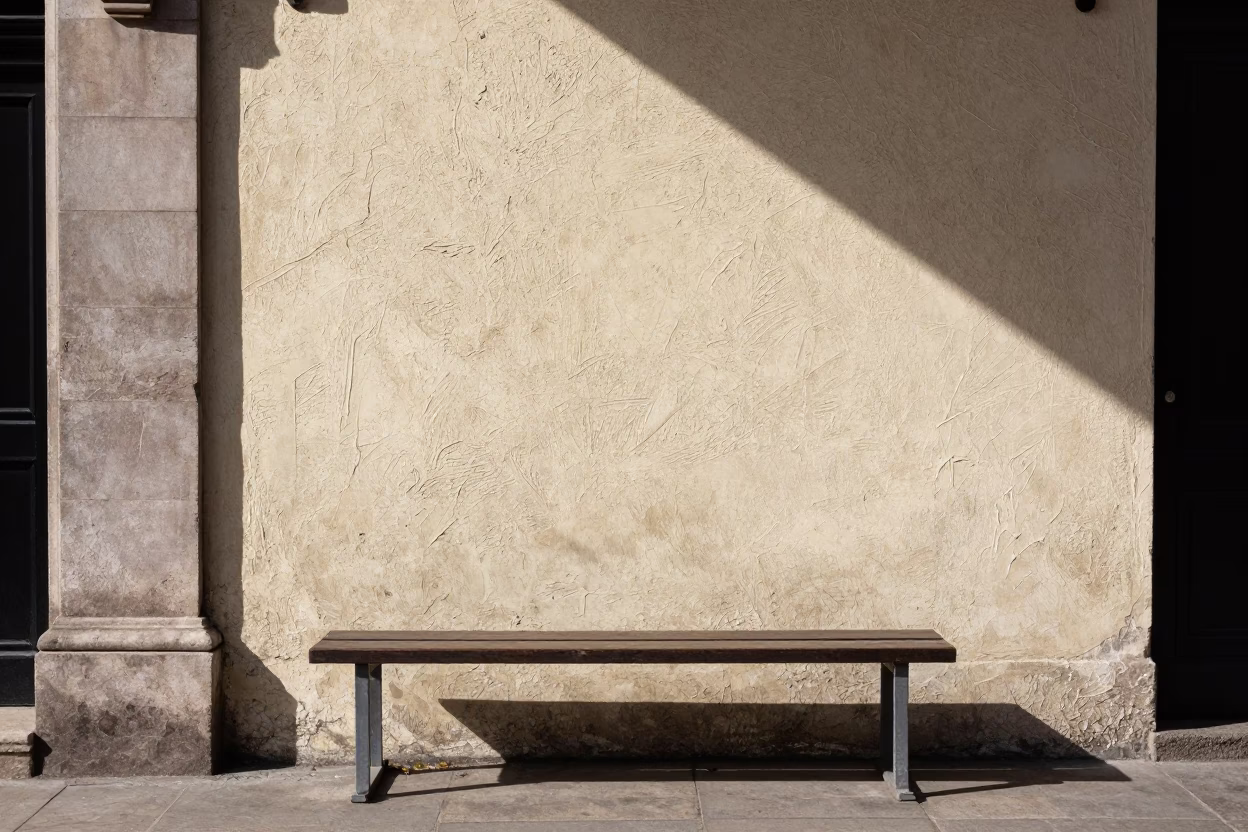 Sunlit Plaster Wall and Steel Bench in Dublin Ireland Midday Street Scene in in Dublin, Ireland