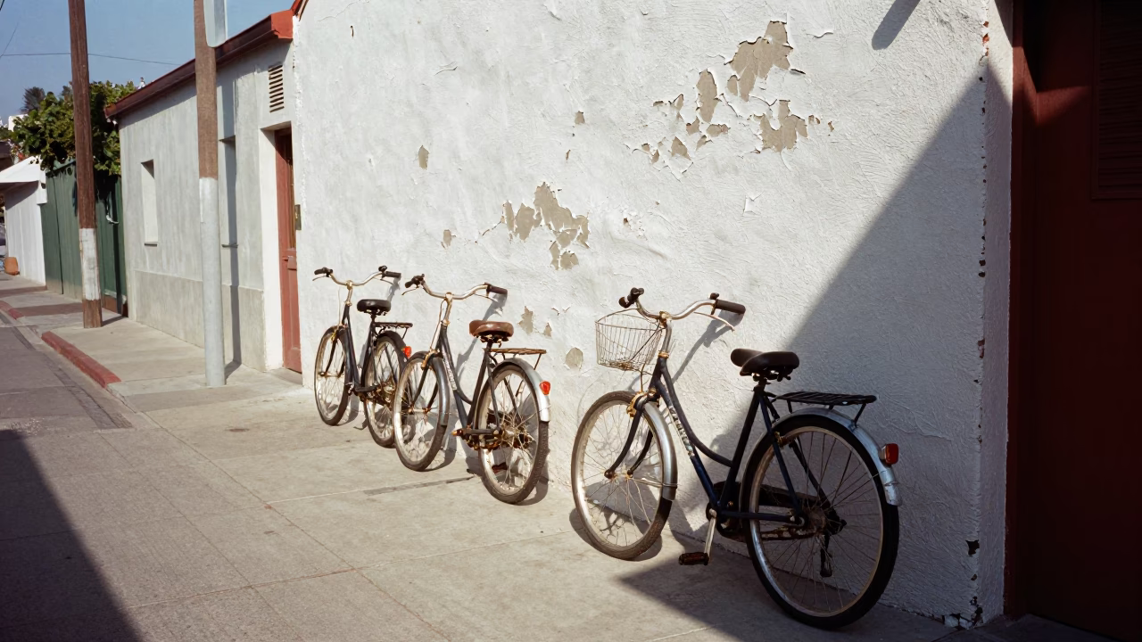 Sunlit San Diego Alleyway with Vintage Bicycles and Peeling Paint in in San Diego, California, United States