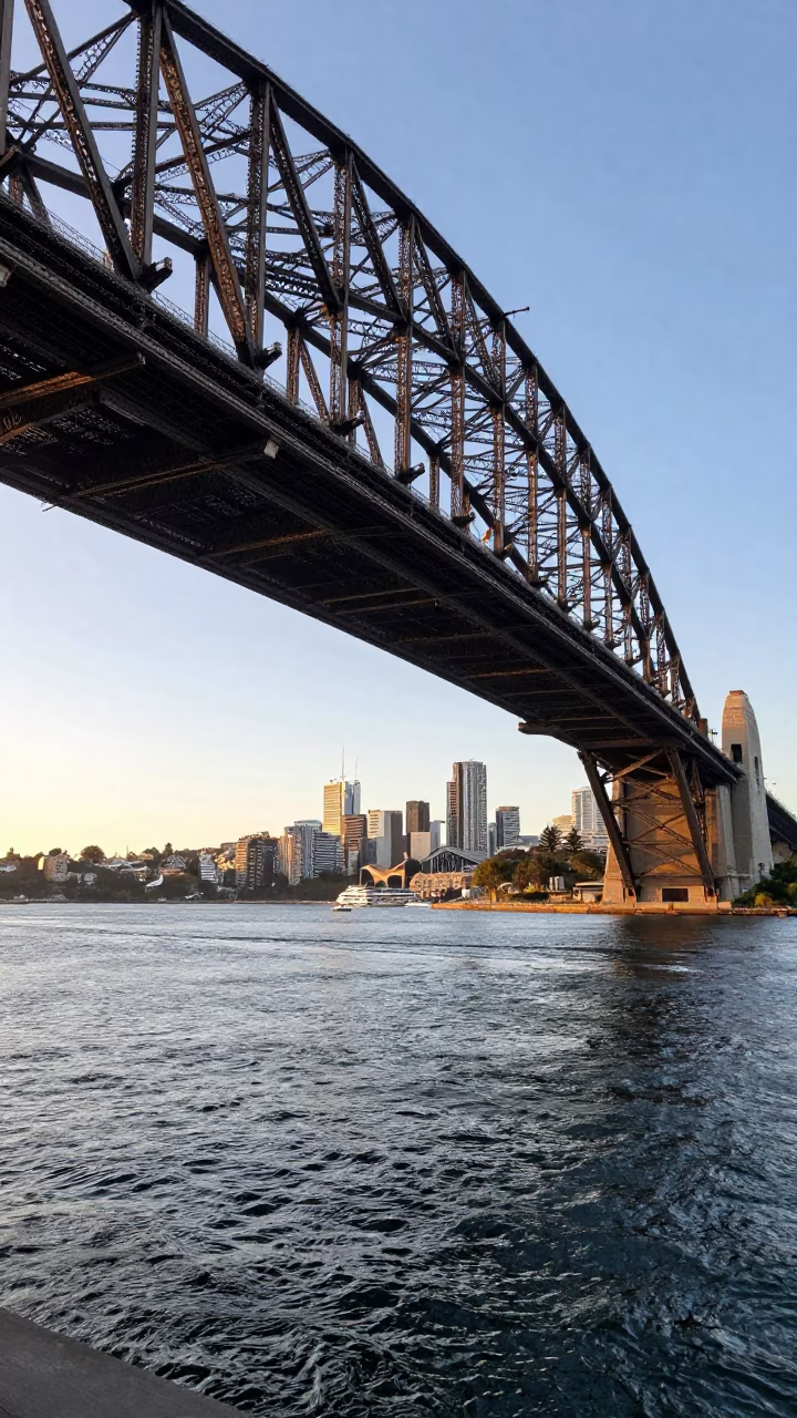 Sunlit Sydney Harbour Bridge Steel and Harbour Water Early Morning Realism in in Sydney, New South Wales, Australia