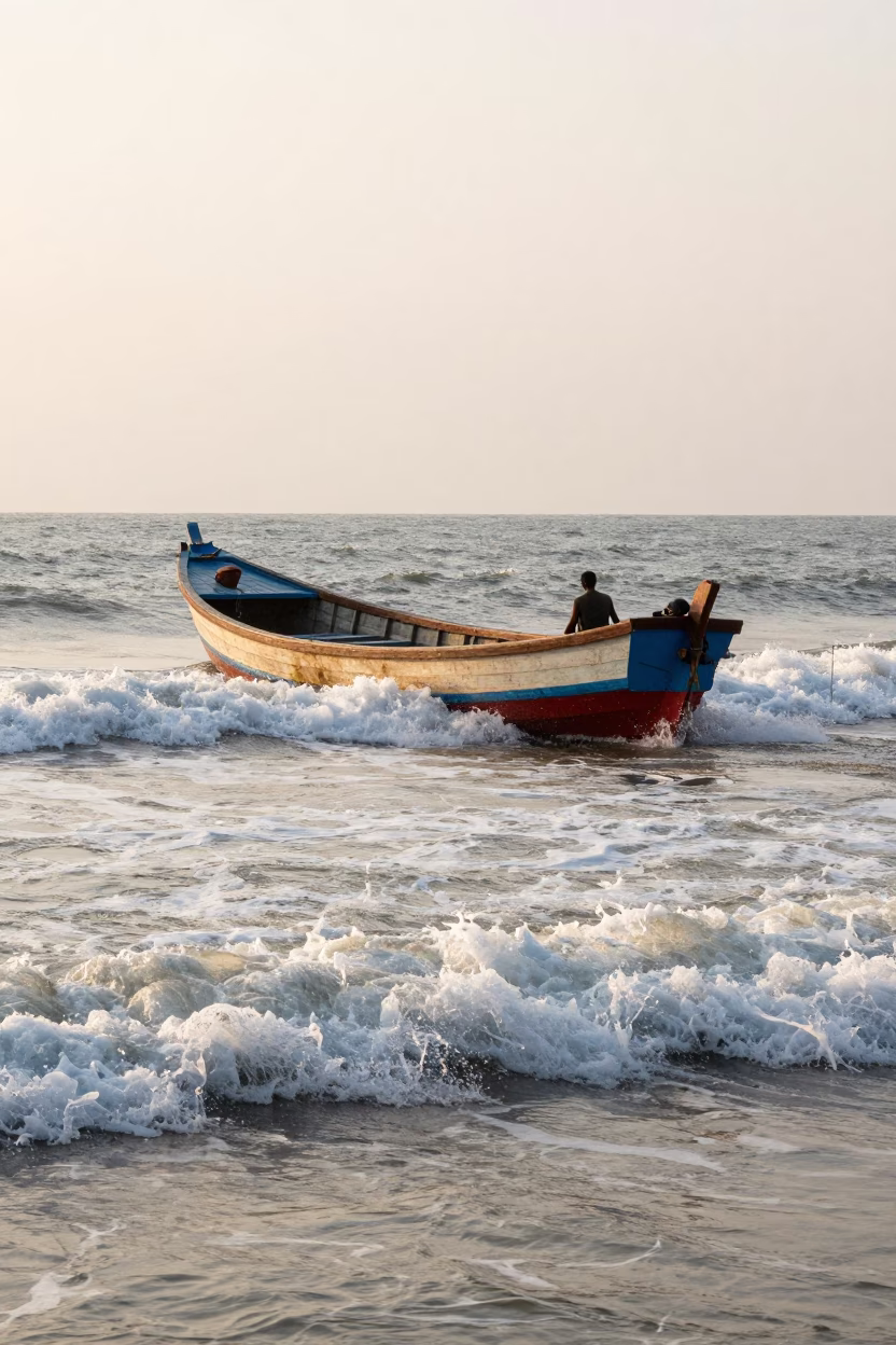 Sunrise Fishing Boat Returning Through Crashing Surf in Kochi India Coastal Harbor in in Kochi, India