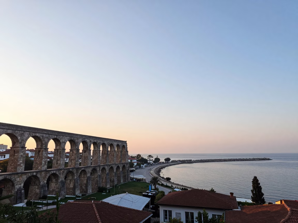 Sunrise Over Izmir Bay Turkey With Roman Aqueduct And Harbor Breakwater View in in Izmir, Turkey