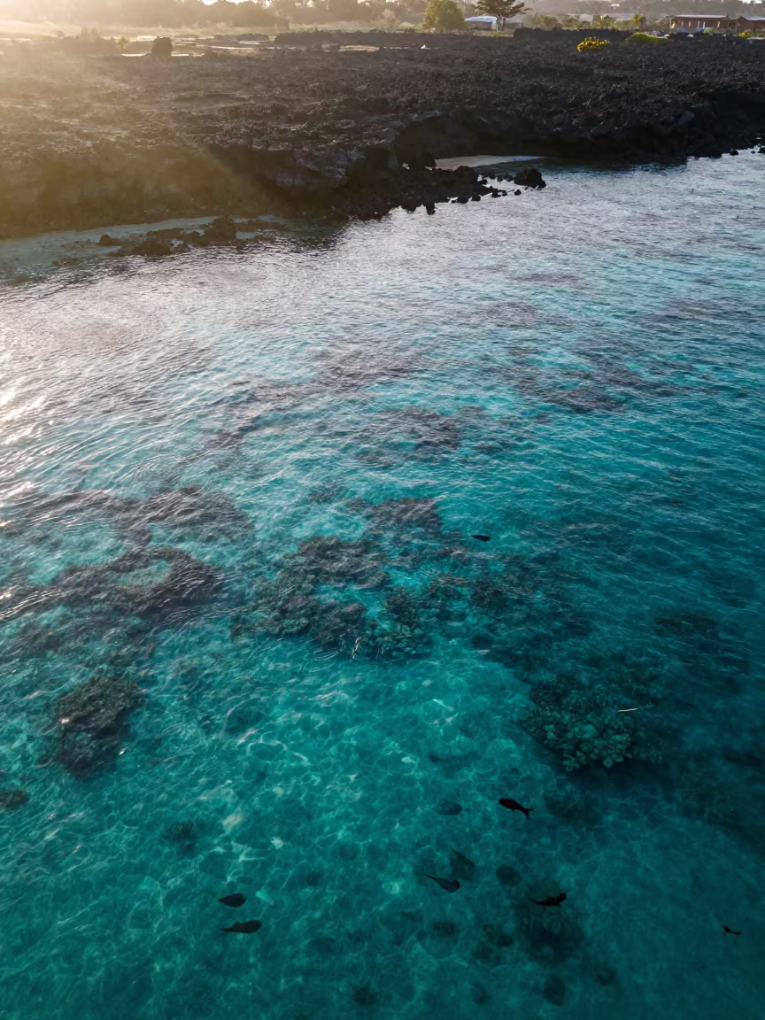 Sunrise Over Zanzibar Volcanic Reef Layers in beside a volcanic reef overhang near Zanzibar