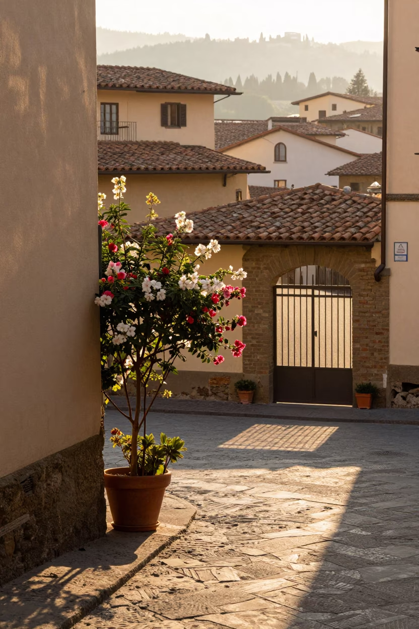 Sunrise Street Scene in Florence Italy with Flowering Plant and Gate Handle in in Florence, Italy