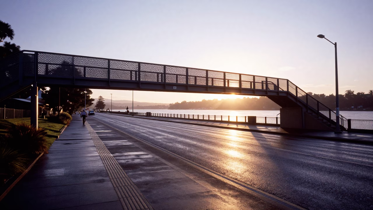 Sunrise street scene in Hobart Tasmania with pedestrian overpass and wet footsteps in in Hobart, Tasmania, Australia