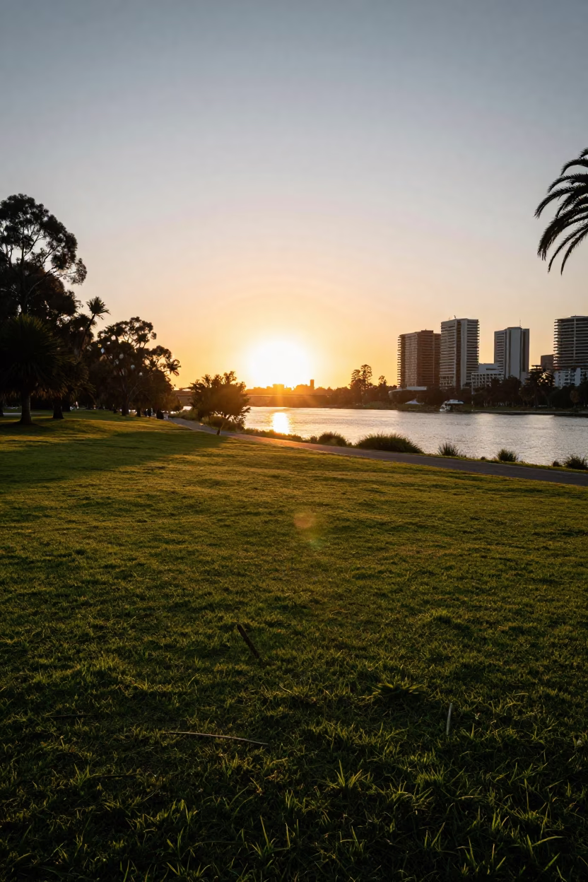 Sunset at Adelaide Park Lands near Torrens River with Vintage Bicycle and Park Bench in in Adelaide, South Australia, Australia