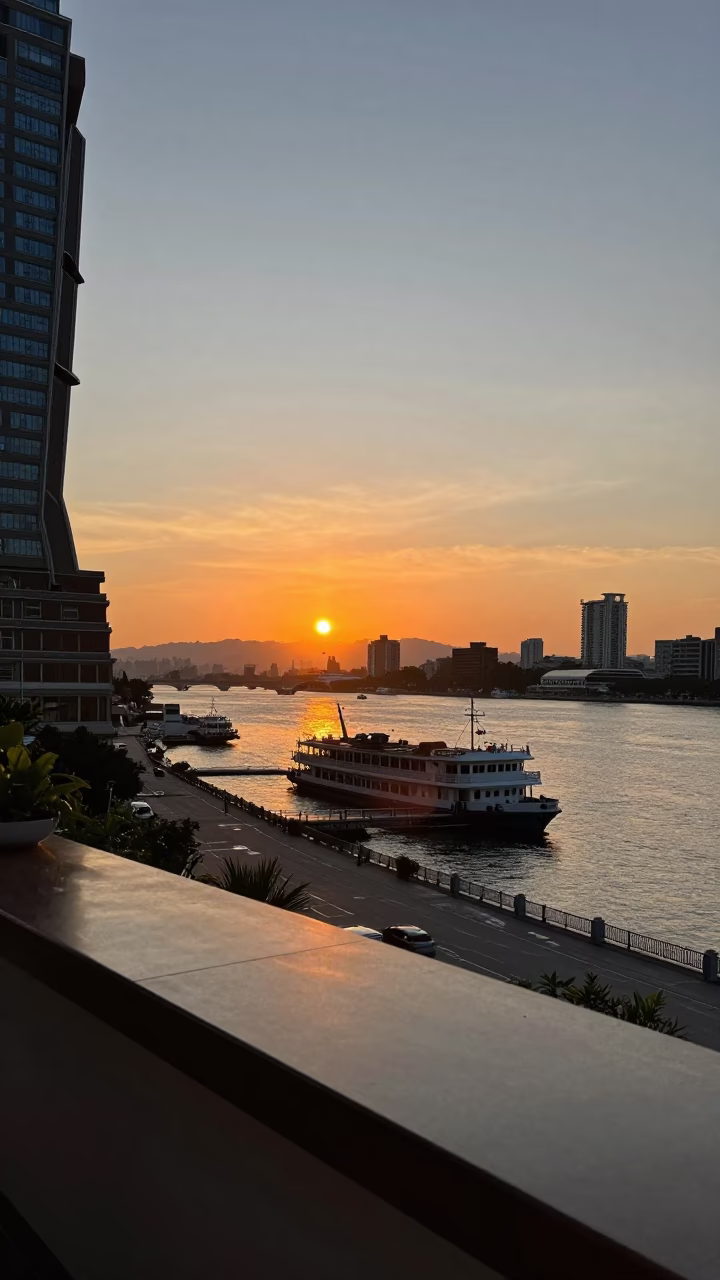 Sunset at As The Sun Drops Toward The Horizon in Kaohsiung in in Kaohsiung, Taiwan