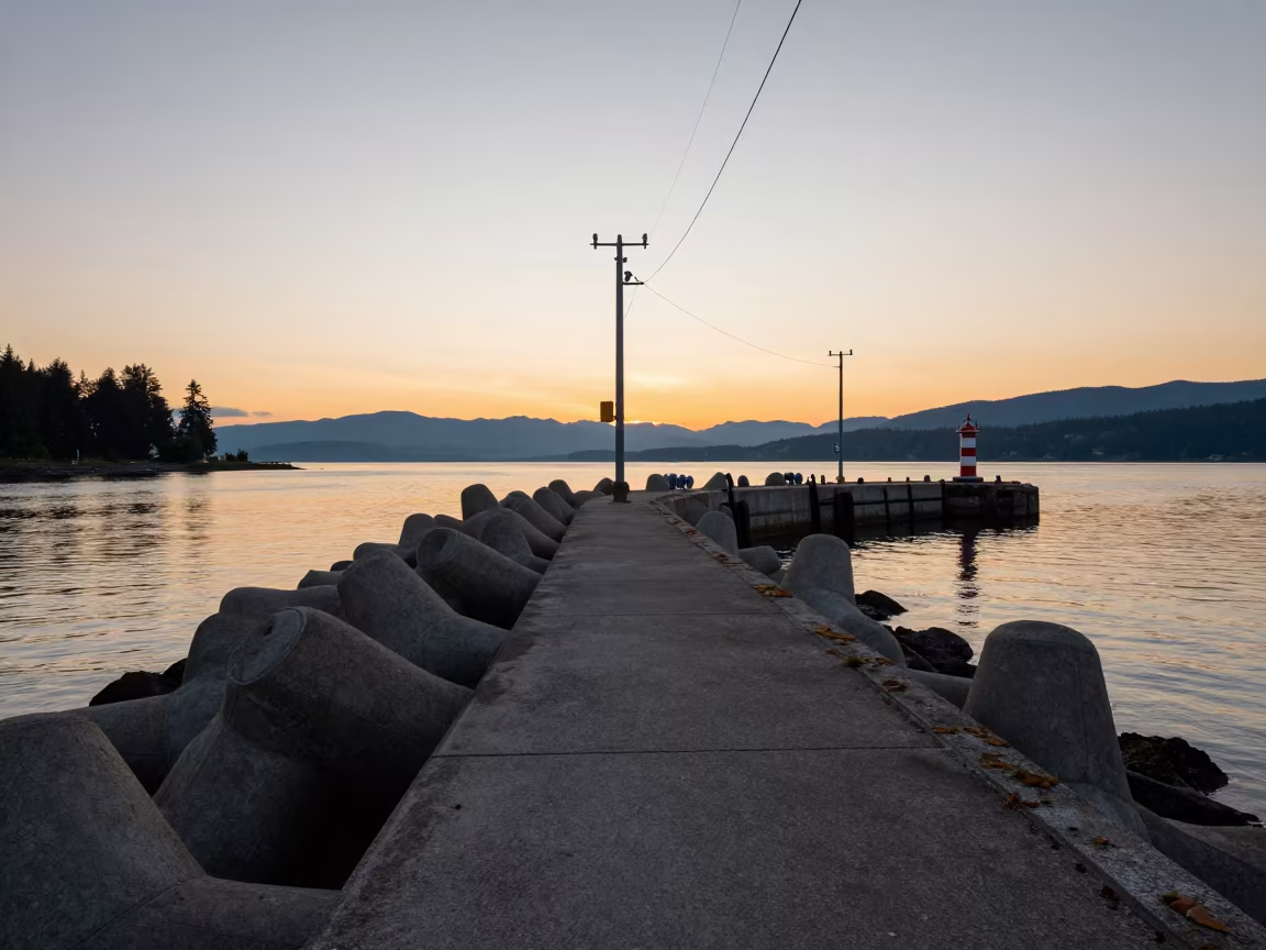 Sunset Glow on British Columbia Breakwater Curve in at a canal lock chamber in British Columbia