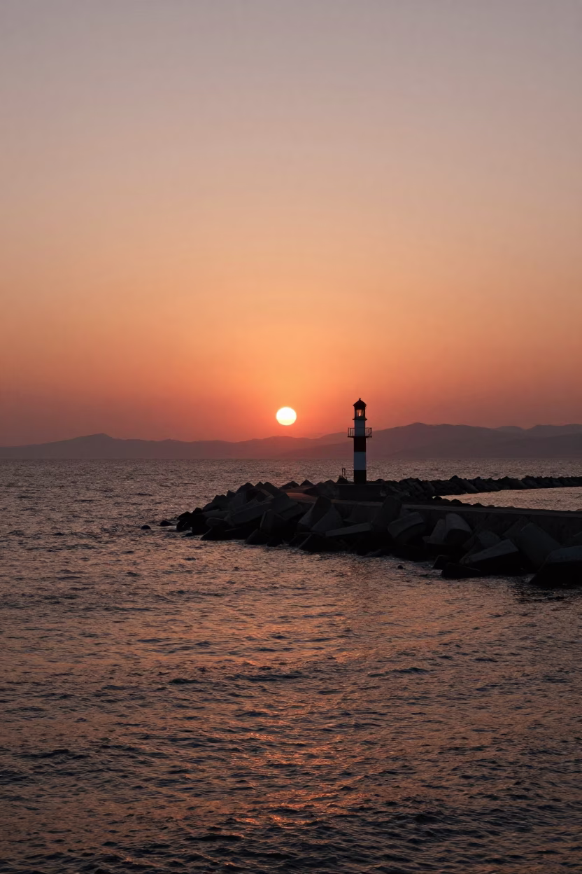 Sunset Harbor View Izmir Turkey Breakwater Curve and Lonely Beacon in in Izmir, Turkey