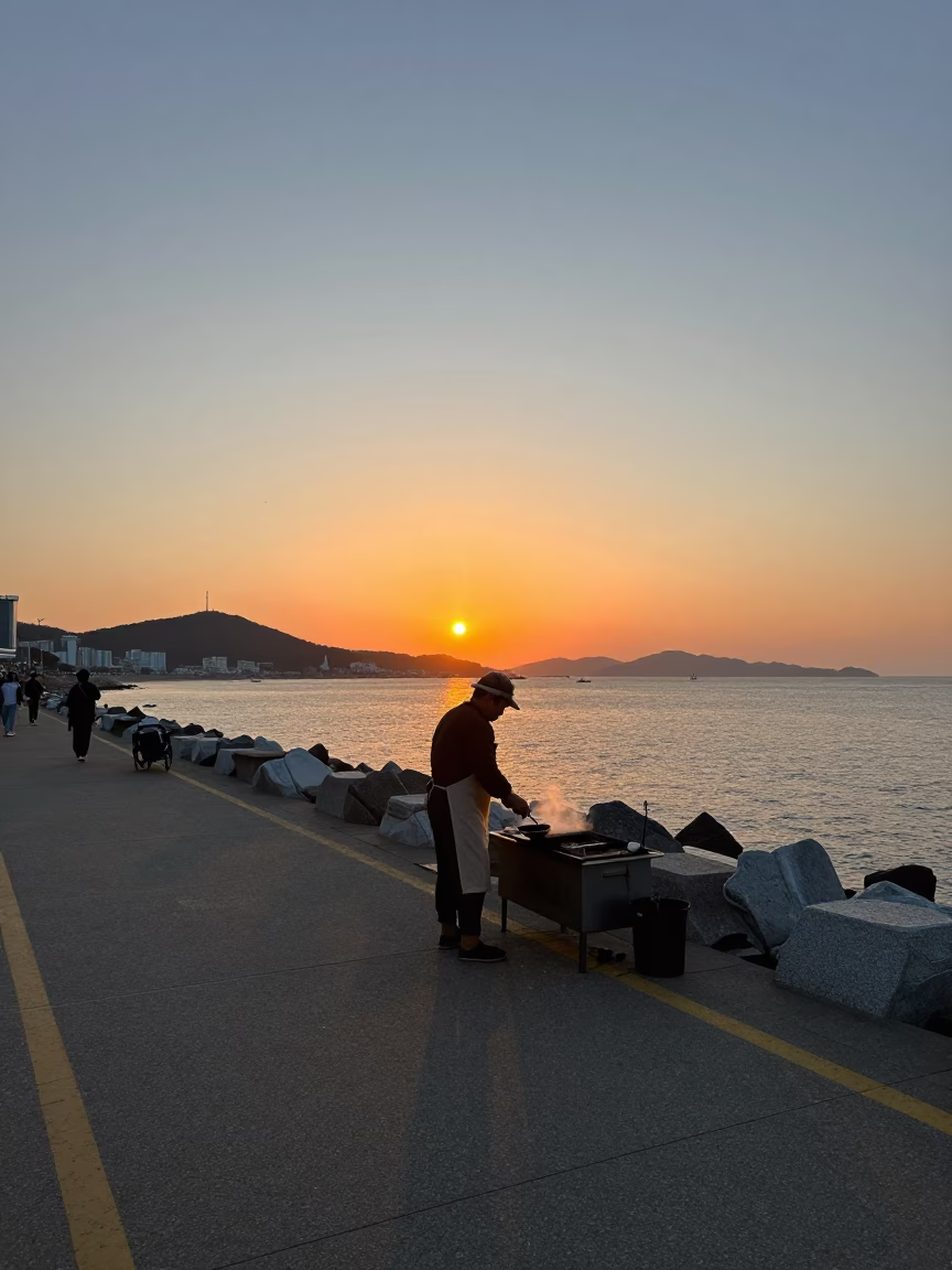 Sunset in Busan at As The Sun Drops Toward The Horizon in in Busan, South Korea